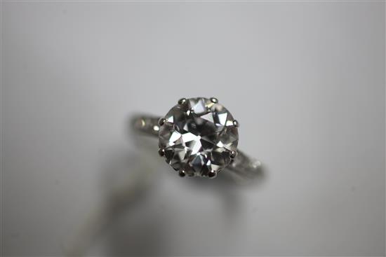 A 1940s/1950s platinum and single stone diamond ring with diamond set shoulders, size L.